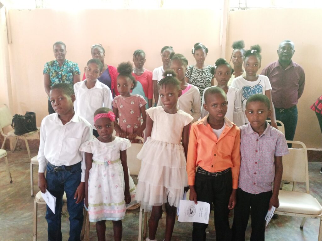 Children from the tysea orphanage stand together for a group photo