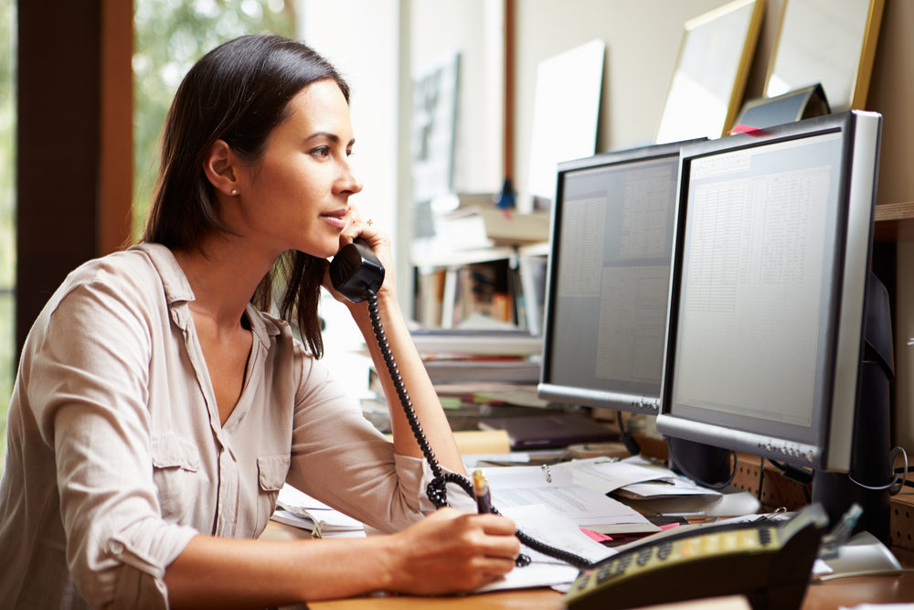 woman on intake call in office